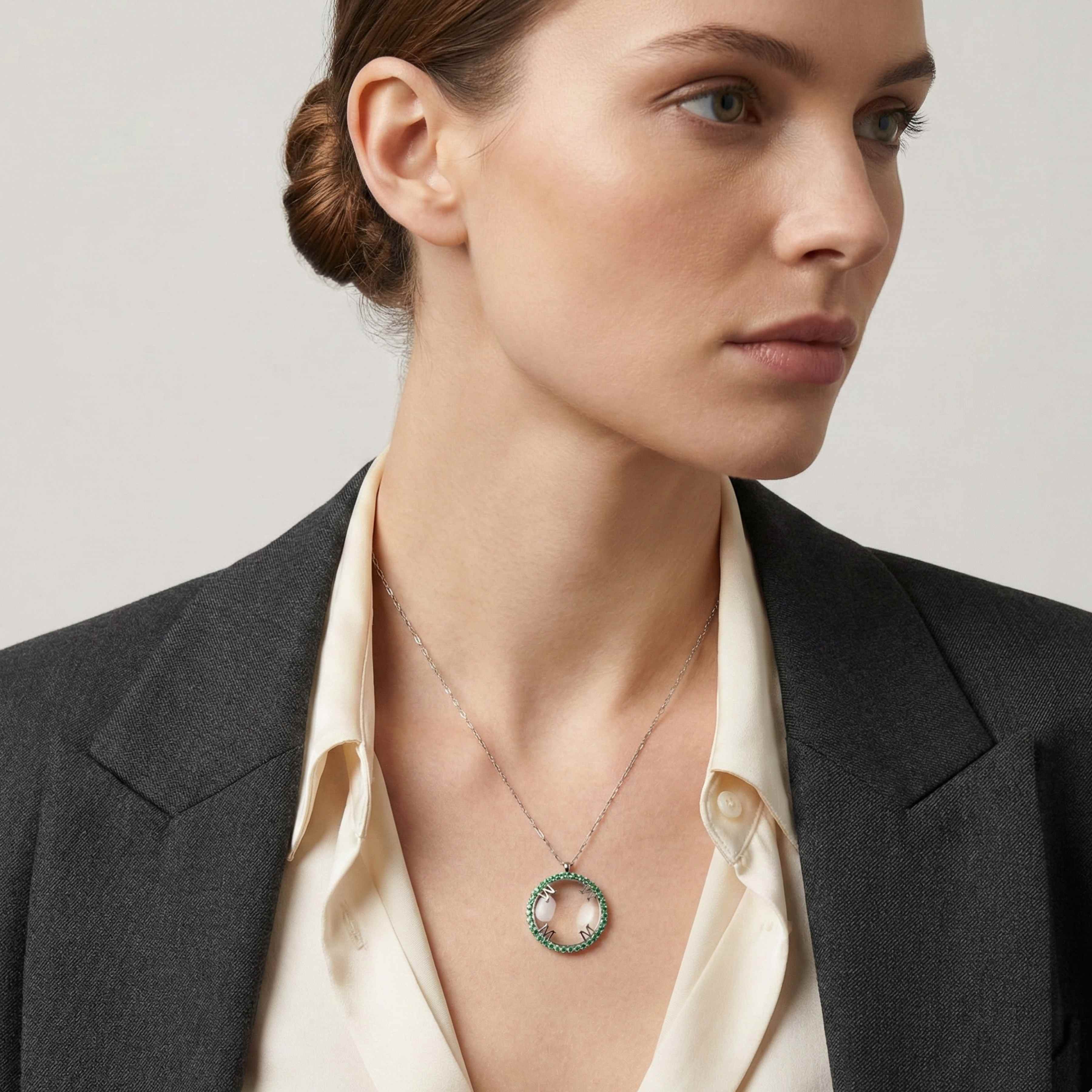 Emerald pendant necklace on model